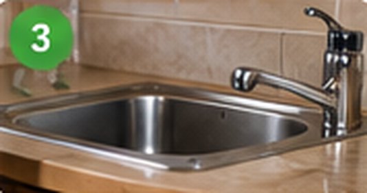 Clean crumbs, grease and dishes; report water leaks.